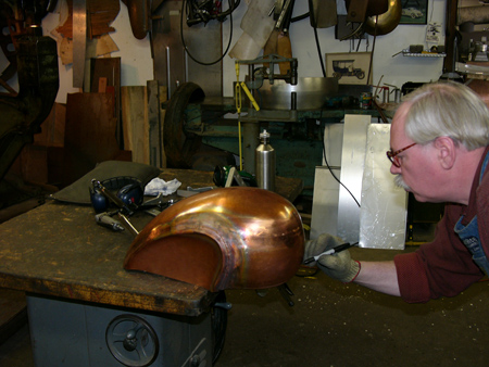 Fay Butler and Jesse James Copper motorcycle tank with side just butt-welded in place